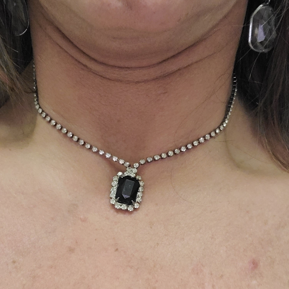 Choker. Black stone with rhinestones around it.